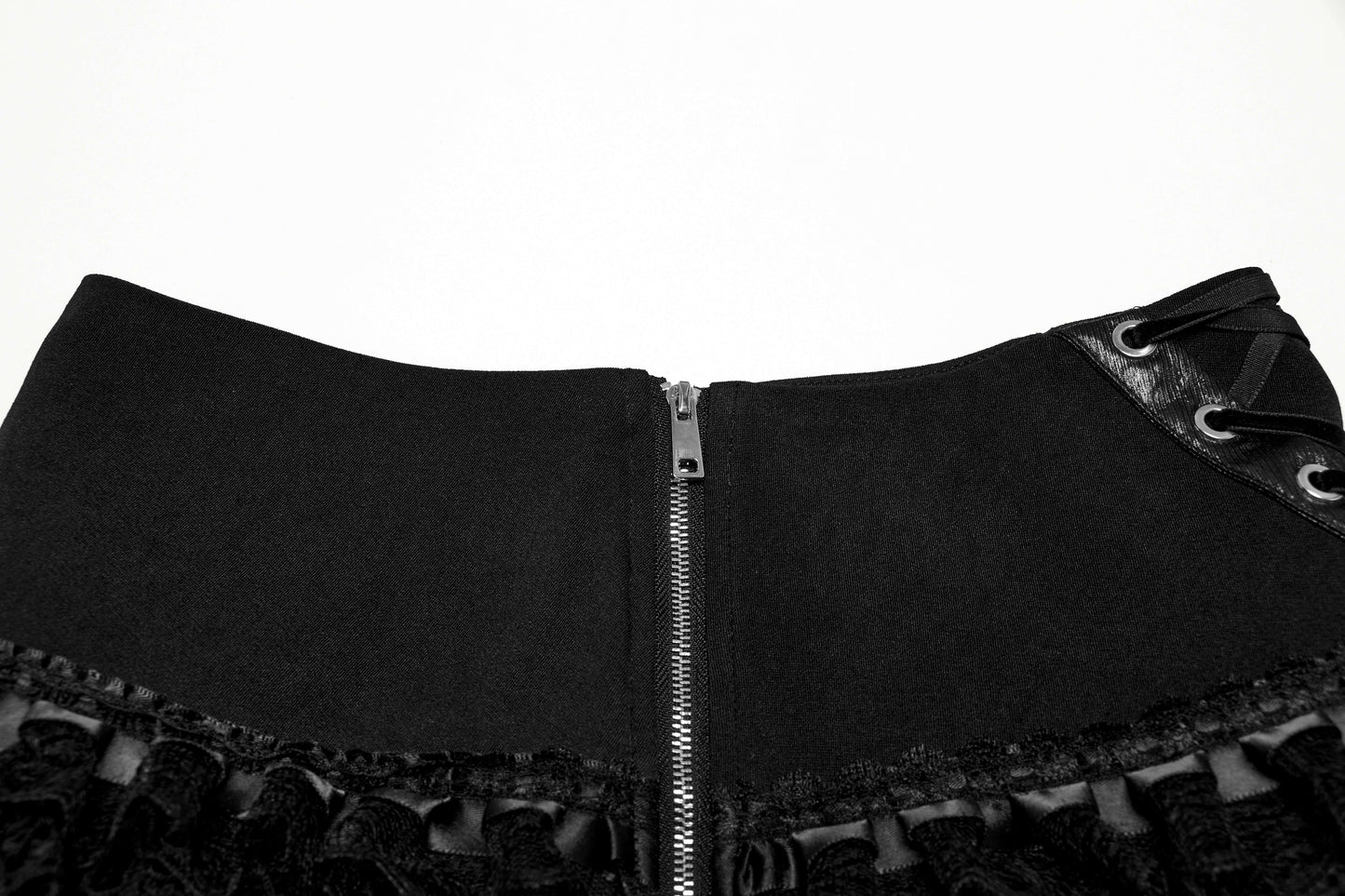 Close-up of the Punk Rave Salome Decadent Layered Cake Skirt's exquisite details, highlighting the stylish side zipper and elegant front draw strap for a sophisticated and edgy look.