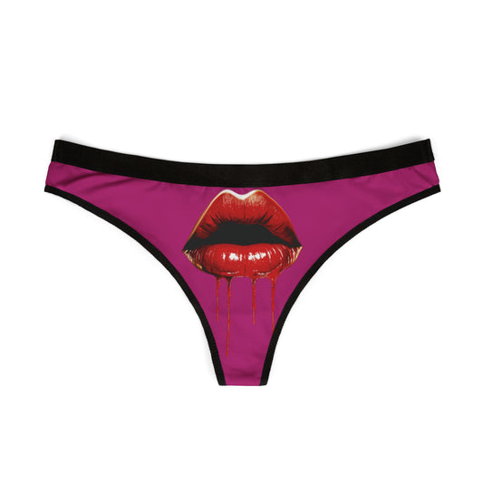 Cheeky women's thong featuring a striking graphic of glossy red lips with dripping red liquid, perfect for playful romantic occasions.