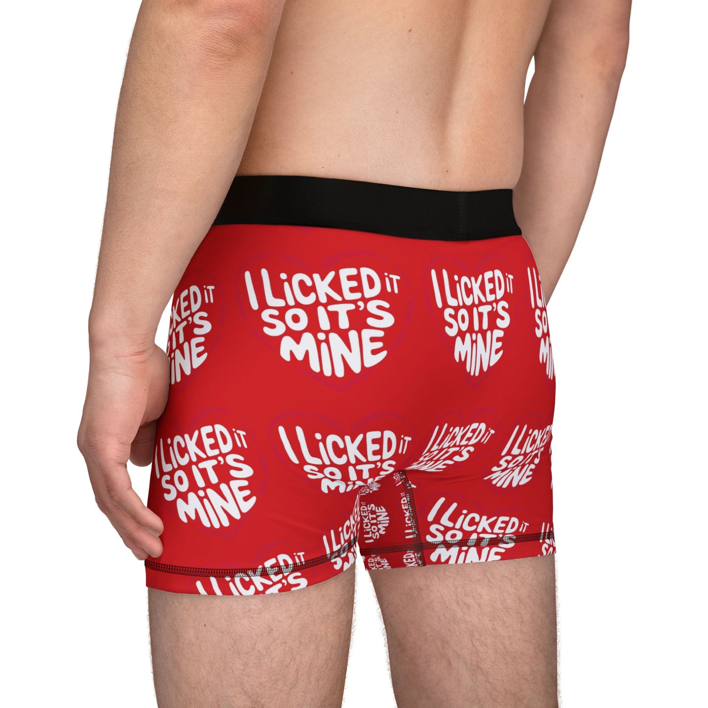 Back view of the Valentines Naughty Cheeky Men's Boxer Briefs displaying the humorous phrase 'I LICKED IT SO IT'S MINE' in a striking white design, designed for comfort and cheeky style on special days.