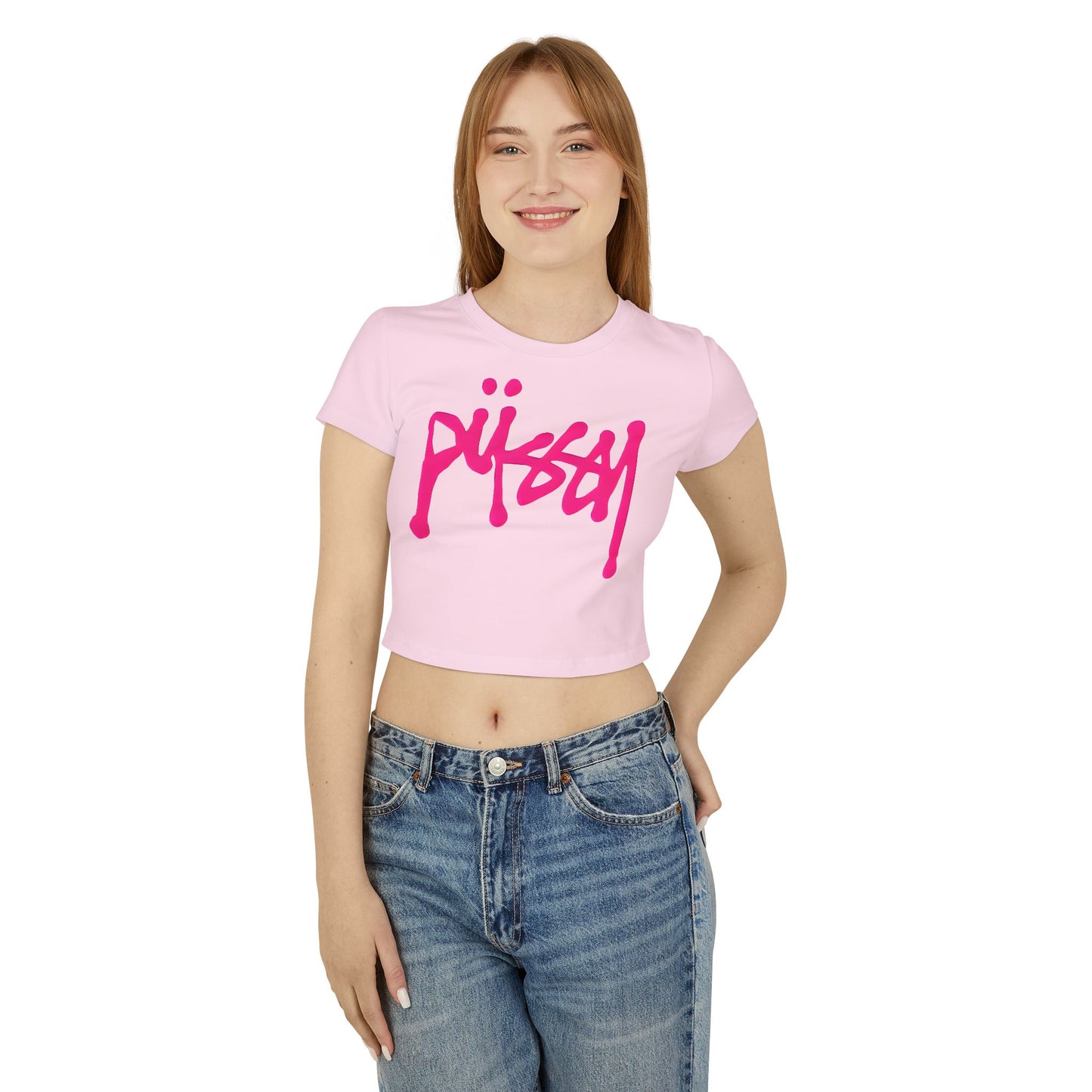 Chic front view of a model wearing a stylish cropped t-shirt in soft pink, adorned with an eye-catching hot pink graphic, embodying playful sophistication.