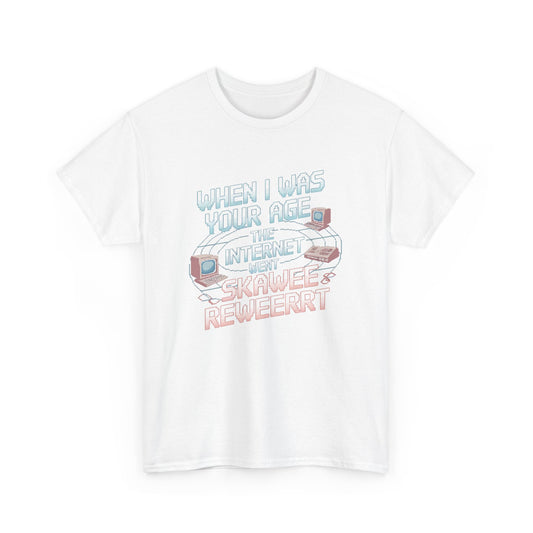 Luxurious graphic tee featuring the phrase 'When I Was Your Age the Internet Went Ska Wee Reweerrt', adorned with pixelated vintage computer illustrations, perfect for nostalgic fashion enthusiasts.