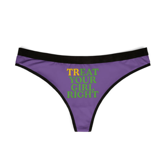 Stylish front view of a women's thong with bold lettering saying 'Treat Your Girl Right', elegantly designed in a rich purple with contrasting black waistband, ideal for chic lingerie.