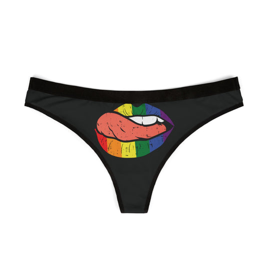 Elegant black women's thong adorned with a vibrant rainbow lip design, ideal for adding a cheeky touch to intimate wear.