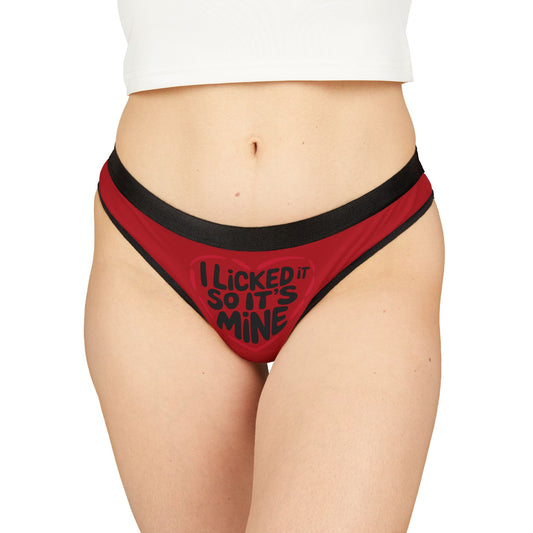 Elegant display of the Valentines Naughty Gift Cheeky Women's Thong with the cheeky phrase 'I Licked It So It’s Mine', modelled to showcase its stylish black waistband and comfortable fit.