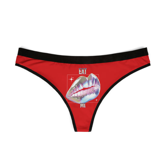 Elegant red thong featuring a holographic lips graphic and the phrase 'Eat Me', ideal for bold statement lingerie.