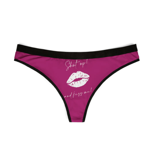 Elegant women's thong featuring a bold kiss graphic and cheeky phrase 'Shut up! and kiss me!', exemplifying flirtatious charm.