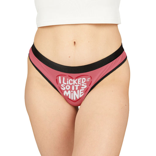 Elegant display of the Valentine's Naughty Gift: Cheeky Women's Thong featuring 'I Licked It So It’s Mine' text, styled on a model for romantic allure.