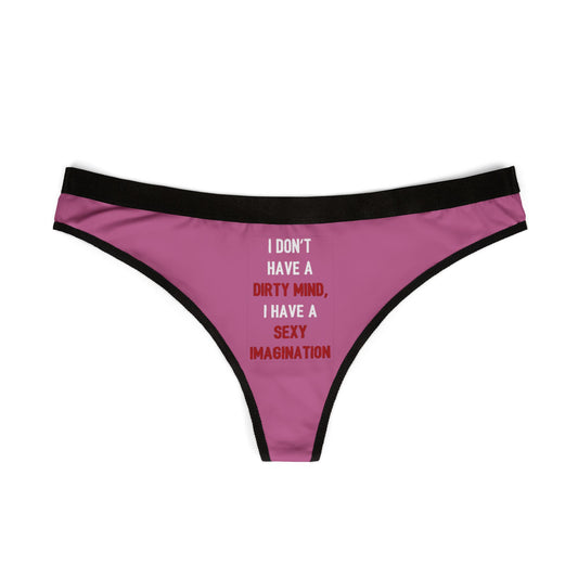 Elegant women's thong in vibrant pink, showcasing the humorous phrase 'I DON'T HAVE A DIRTY MIND, I HAVE A SEXY IMAGINATION', ideal for gifting on special occasions.