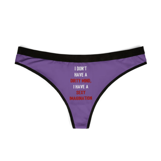 Stylish purple women's thong with bold graphic text 'I DON'T HAVE A DIRTY MIND, I HAVE A SEXY IMAGINATION', designed for enticing gifts and playful intimacy.