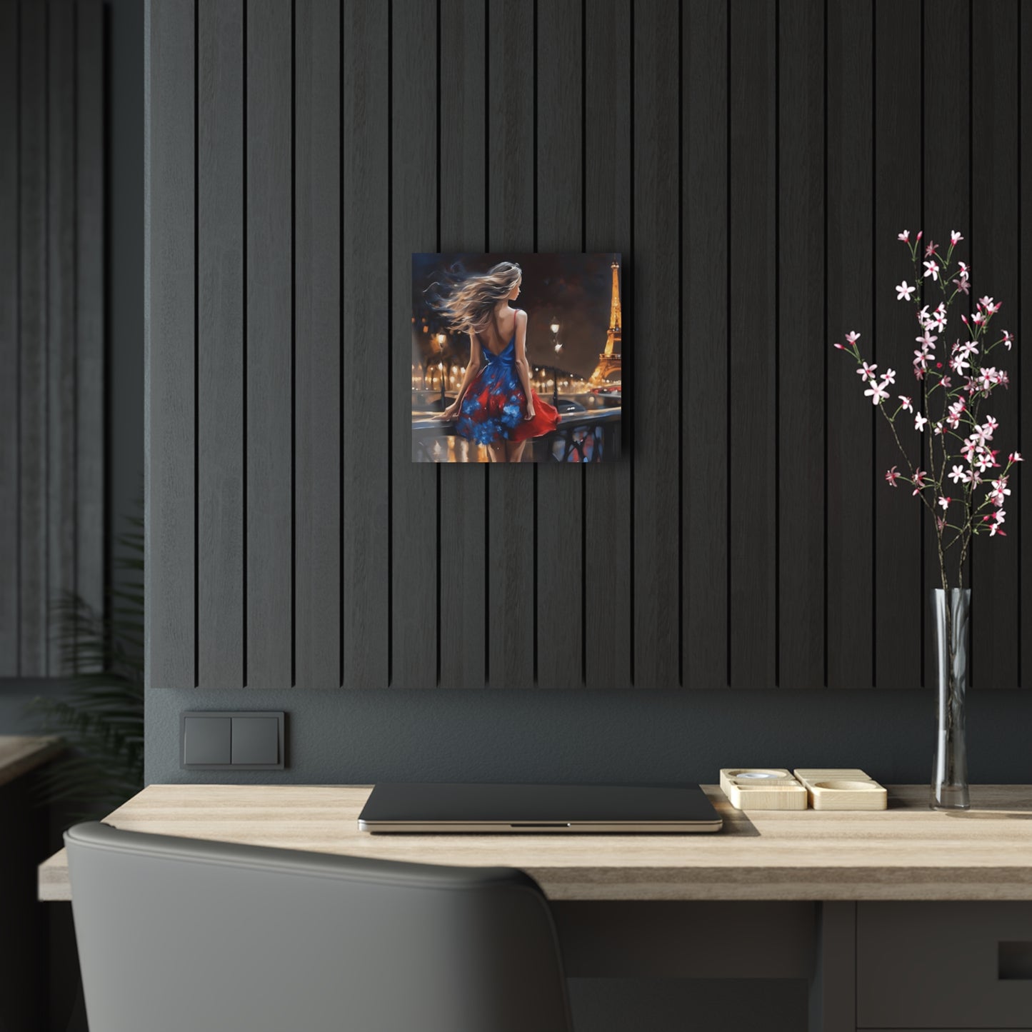 The Captivating Enchantment: City Stroll Acrylic Print displayed elegantly on a wall, showcasing its charming design in a sophisticated interior setting. The piece beautifully depicts a woman against the backdrop of Paris, enhancing the decor with its artistic allure.