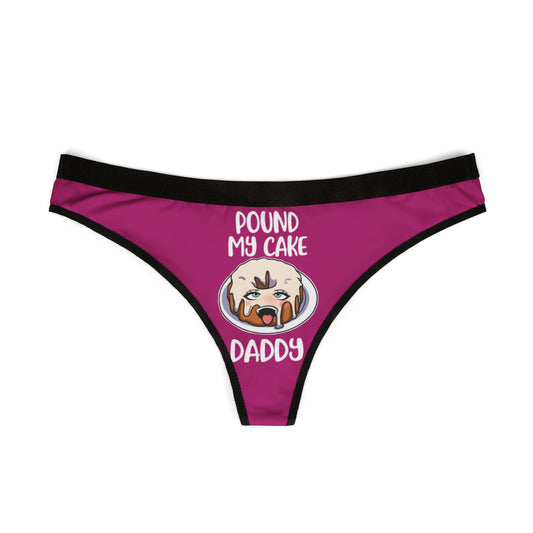 Stylish women's thong in rich purple showcasing a whimsical 'Pound My Cake' design, perfect for a humorous and luxurious intimate occasion.