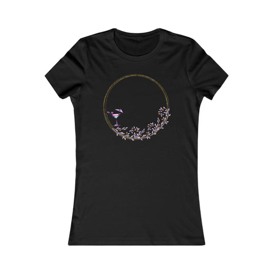 Stylish black women's t-shirt showcasing a minimalist design with a cocktail glass within a floral wreath, accompanied by the phrase 'Drinks well with others', ideal for sophisticated events.