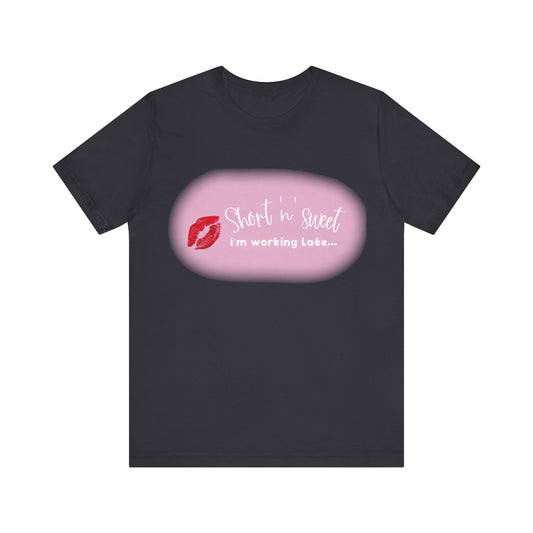 Sabrina Carpenter Inspired Unisex Short Sleeve Tee in black featuring a vibrant lipstick print with the text 'Short n sweet, I'm working late...' for a luxurious fashion statement.