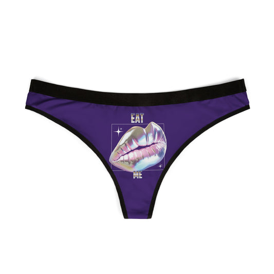 Elegant purple thong with a glamorous holographic lip graphic and metallic lettering, perfect for confident femininity