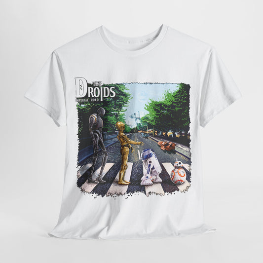 Stylish white graphic tee with 'The Droid's Imperial Road' artwork, displaying beloved Star Wars droids at a crosswalk, combining nostalgia and modern design for a chic statement piece.