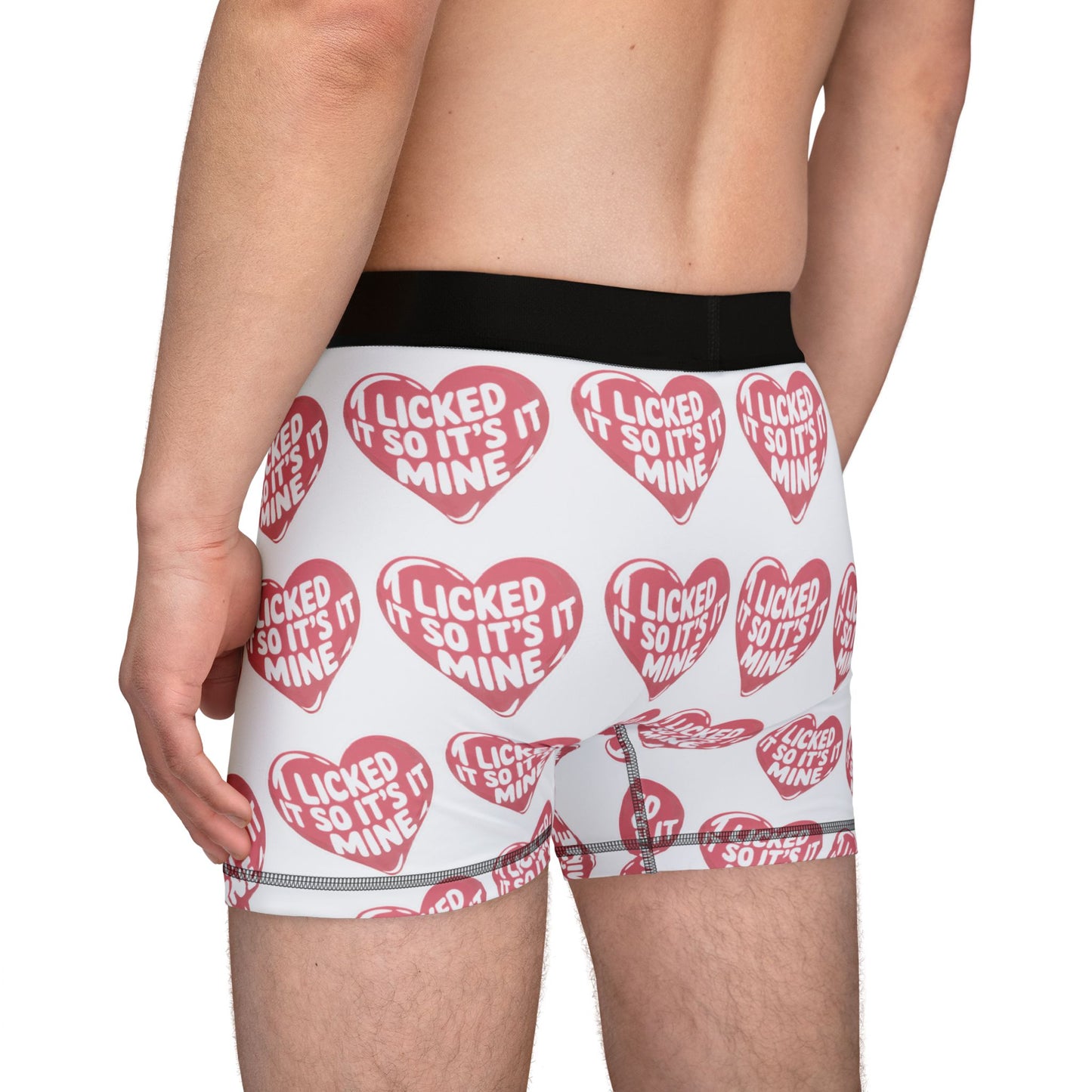 Side view of a man wearing Valentines Naughty Cheeky Men's Boxer Briefs, featuring humorous love-themed graphics, ideal for making a stylish statement on romantic occasions.