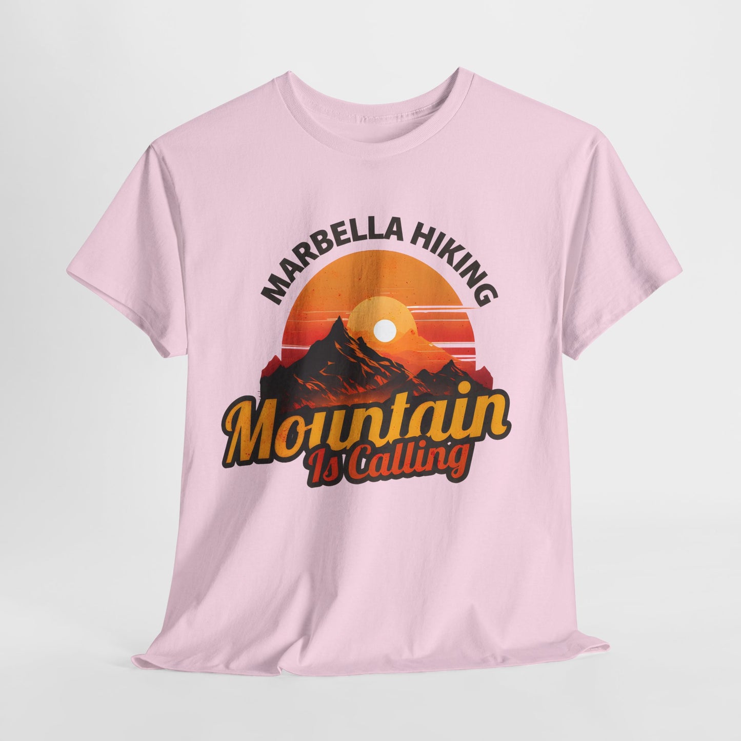 Marbella Hiking Club Unisex Graphic T-Shirt in soft pink, adorned with a striking mountain design symbolising adventure and the spirit of the great outdoors.