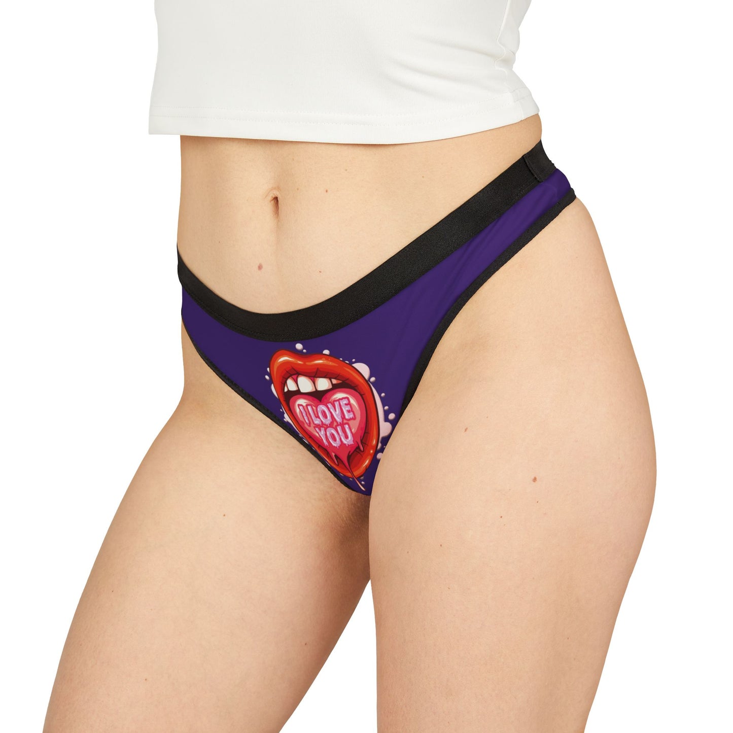 Fashion-forward women's thong with a stunning graphic of a mouth and the phrase 'I LOVE YOU', designed in a playful yet sophisticated purple tone.
