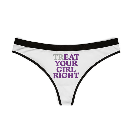 Elegant white women's thong displaying the playful 'Treat Your Girl Right' slogan in vibrant purple, designed to empower and allure.