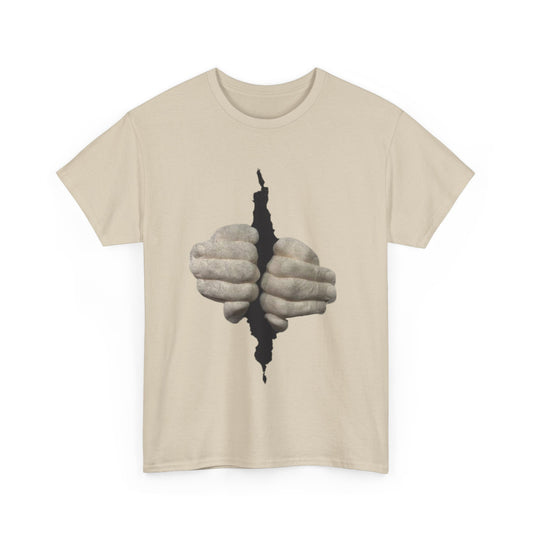 Let Me Out Funny Graphic Unisex T Shirt showcasing a striking graphic of clasped hands emerging from a tear, a blend of artistry and humour for distinctive wear.