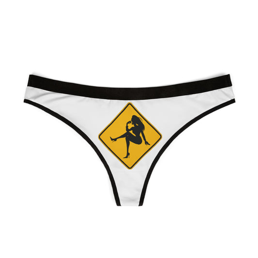 Elegant women's thong featuring a playful graphic design with a silhouette and a caution sign, embodying cheeky romance and youthful allure, perfect as a unique gift for special occasions.