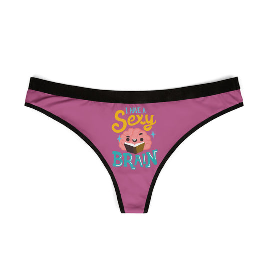 Chic women's thong in a soft pink hue showcasing a fun design with the saying 'I have a sexy brain', ideal for playful and intimate occasions.