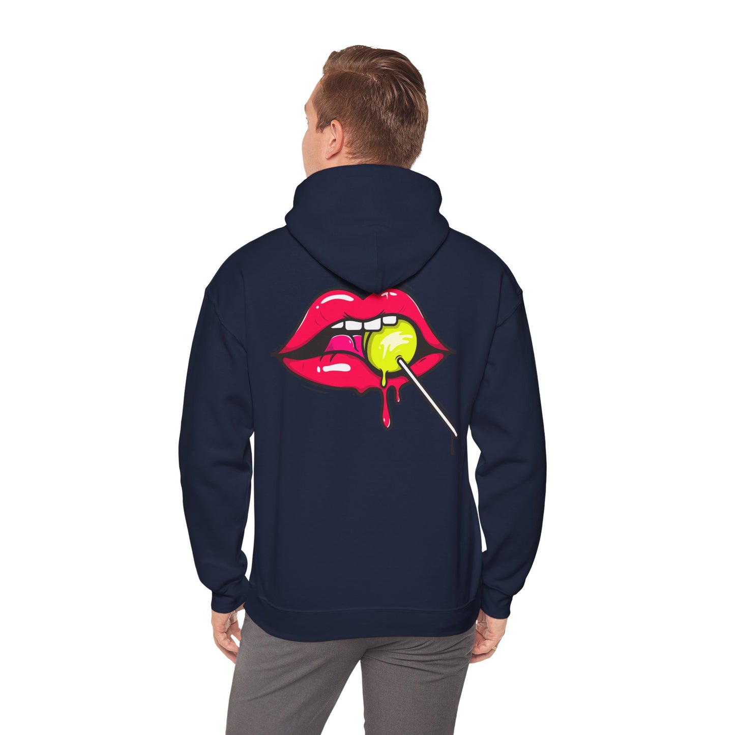 Stylish male model wearing a navy hoodie with a striking back print of seductive red lips and a dripping lollipop, exemplifying contemporary streetwear fashion.