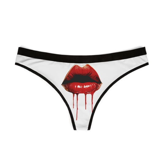 Elegant women's thong adorned with a striking design of bold red lips and a dripping effect, perfect for adding flair to any lingerie collection.