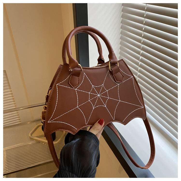 Halloween Spider Web Saddle Bag in rich brown, elegantly designed with spider web detailing, perfect for adding a luxurious touch to your Halloween accessories.