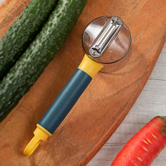 Artistic close-up of a premium vegetable peeler demonstrating its sharp stainless steel blade alongside fresh produce like cucumbers and carrots on a wooden cutting board.
