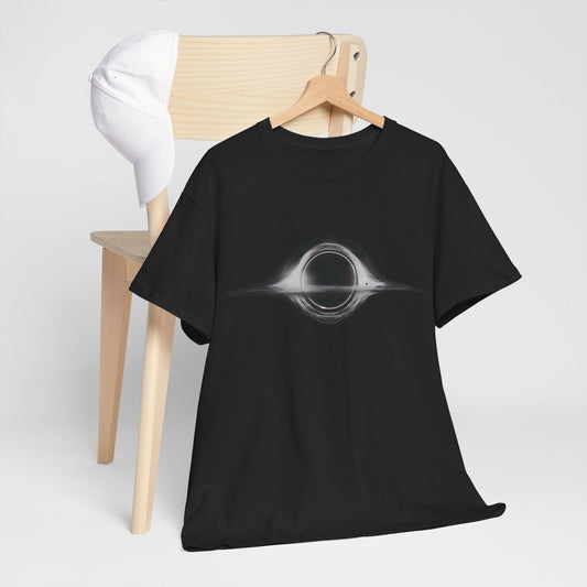 Elegant Interstellar Black Hole Graphic Tee showcased on a wooden hanger alongside a white cap, ideal for a trendy casual outfit.
