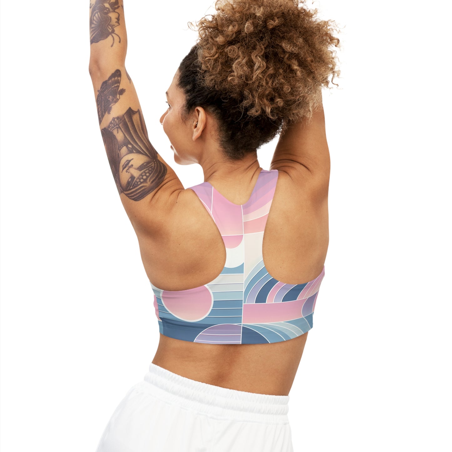 Flat lay of Celeste Rutherford Pastel-Gradient Sports Bra by Dazzling Dreams Studio, emphasising the modern pastel colours and sophisticated detailing ideal for fitness enthusiasts.