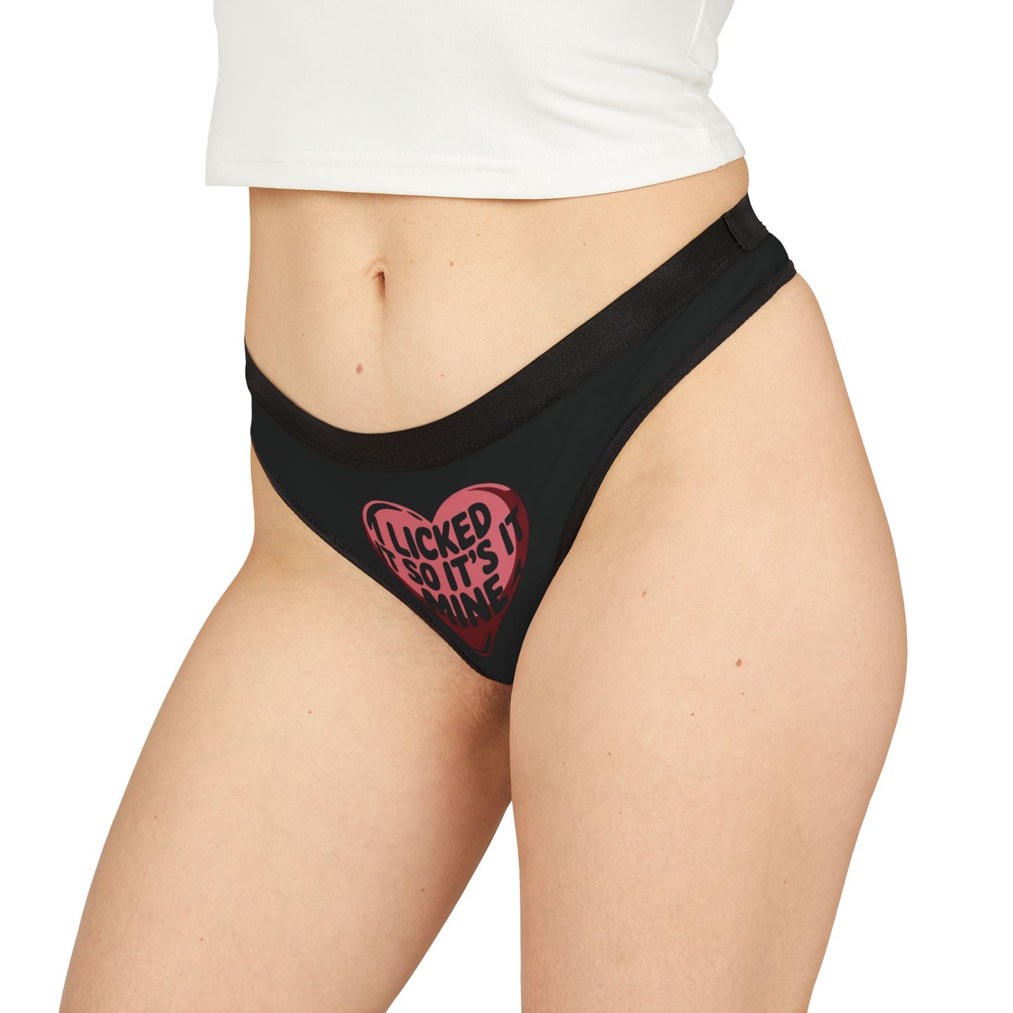 Close-up view of the Valentines Naughty Gift Cheeky Womens Thong with 'I Licked It So It's Mine' slogan, highlighting its bold graphic on luxury lingerie.