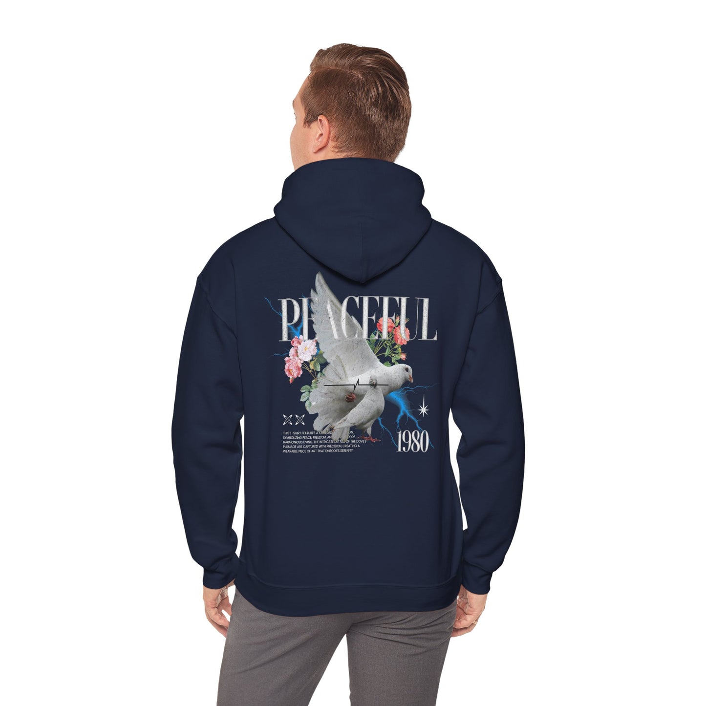Premium back view of a navy blue hoodie adorned with an artistic dove and floral graphic, showcasing the word 'PEACEFUL' in a luxurious design.