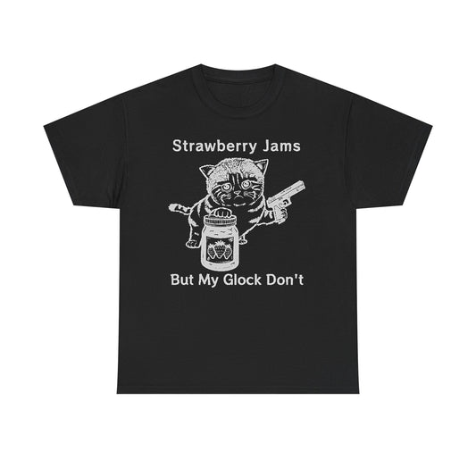 Elegant black graphic t-shirt showcasing a charming cat design with a jar of strawberry jam and a handgun, complemented by the phrase 'Strawberry Jams But My Glock Don't' in stylish print.
