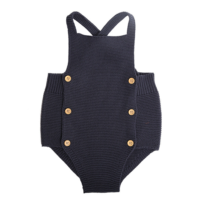 Stylish Baby Girl Cotton Romper in classic navy blue, designed with chic cross-back straps and refined button details, ideal for luxurious all-season wear.