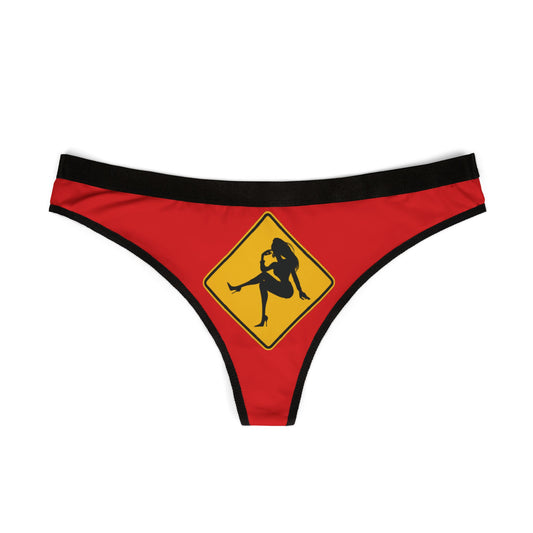 Chic red women's thong with a striking dancer graphic in a warning style sign, perfect for adding a touch of humour to intimate wear for special occasions.