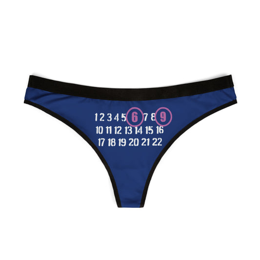 Elegant blue thong adorned with a humorous print of numbers, highlighting '6' and '9' in vibrant circles, perfect for playful intimacy.