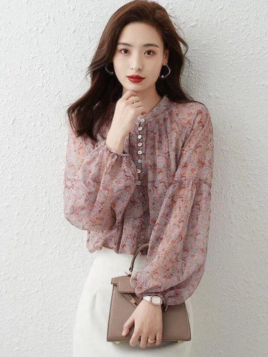 Close-up view of the Elegant Women's Chiffon Blouse M-4XL with High Neck and Gathered Sleeves, featuring buttons and elegant puffed sleeves, perfect for sophisticated occasions.