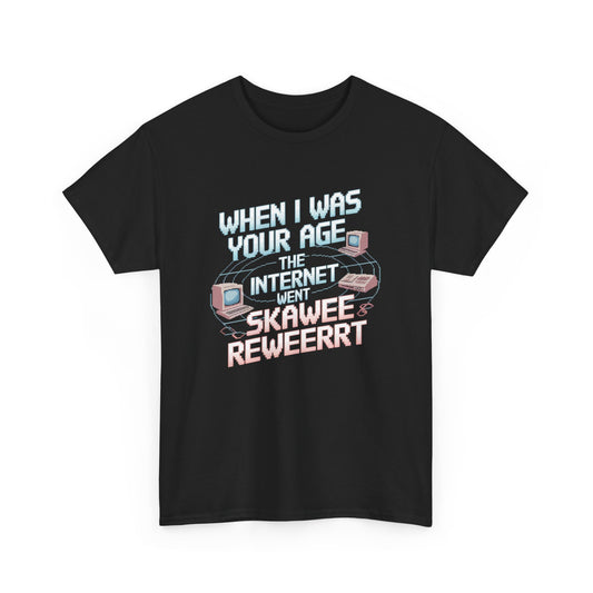 Stylish black graphic t-shirt showcasing the phrase 'When I Was Your Age the Internet Went Ska Wee Reweerrt', accompanied by playful retro computer designs, perfect for adding a touch of nostalgia to any wardrobe.