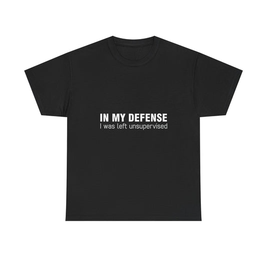 Luxury Urban Graphic T-Shirt featuring the text 'In My Defence I Was Left Unsupervised' in a sleek design, available in black cotton.