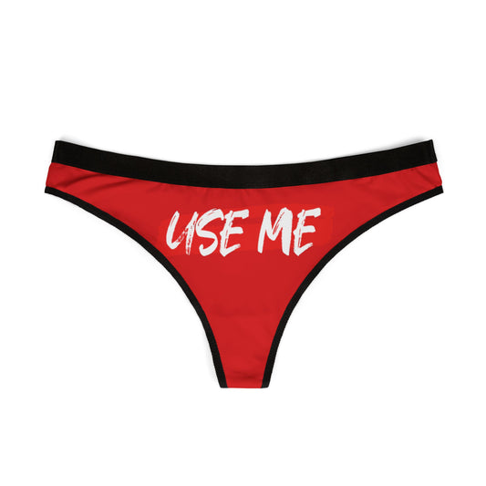 Stylish red women's g-string thong with a striking 'USE ME' print, perfect for romantic and humorous gifting.