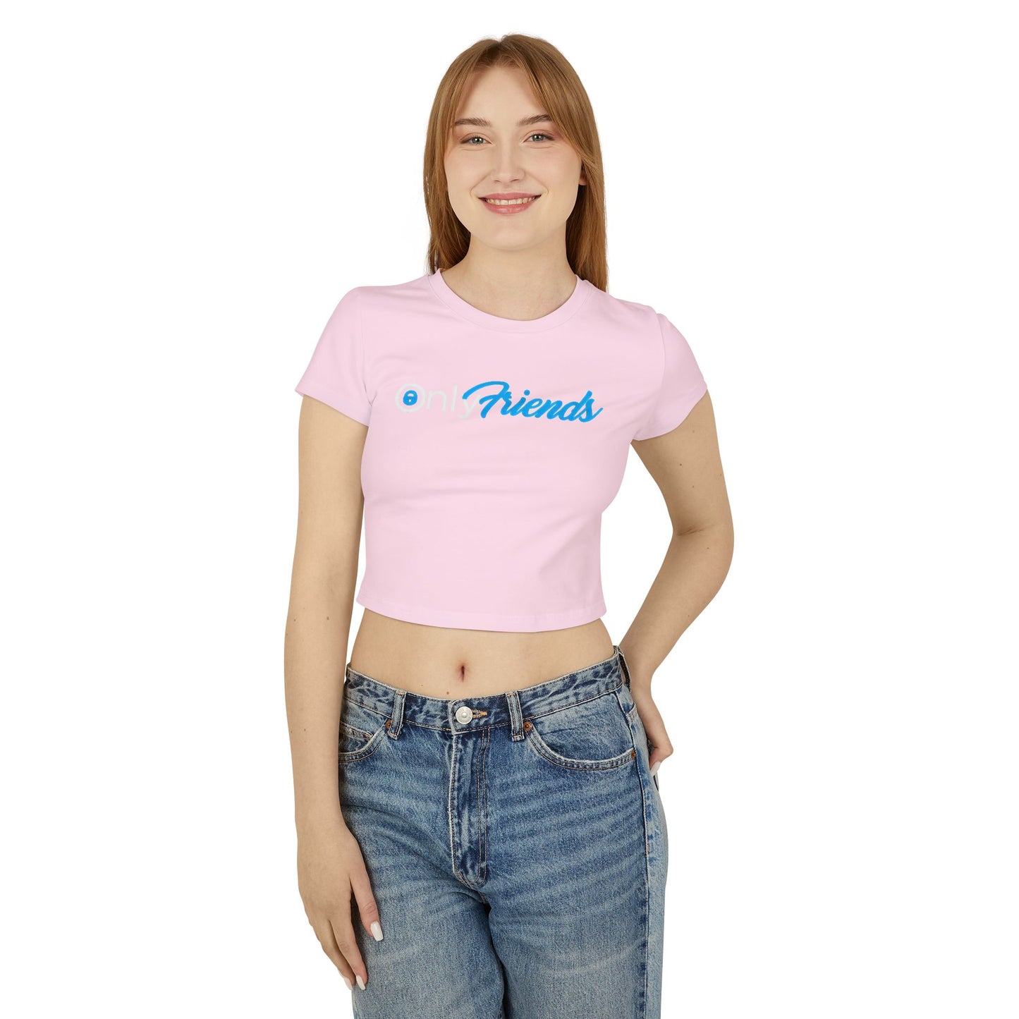 Elegant pink cropped t-shirt on a model, adorned with the whimsical 'Only Friends' design in vibrant blue script, exuding charm and a touch of playfulness.