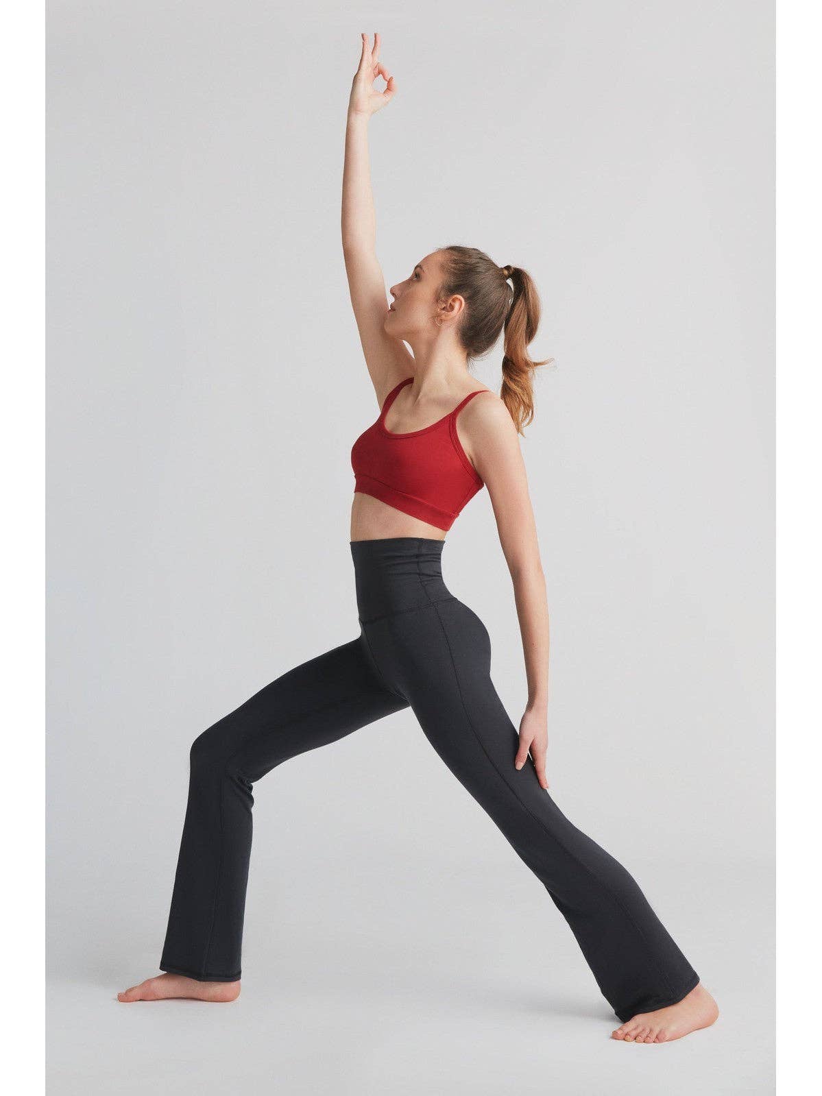 Eco-friendly luxury Tencel leggings with flared legs, moisture-regulating fabric designed for active and leisure wear.