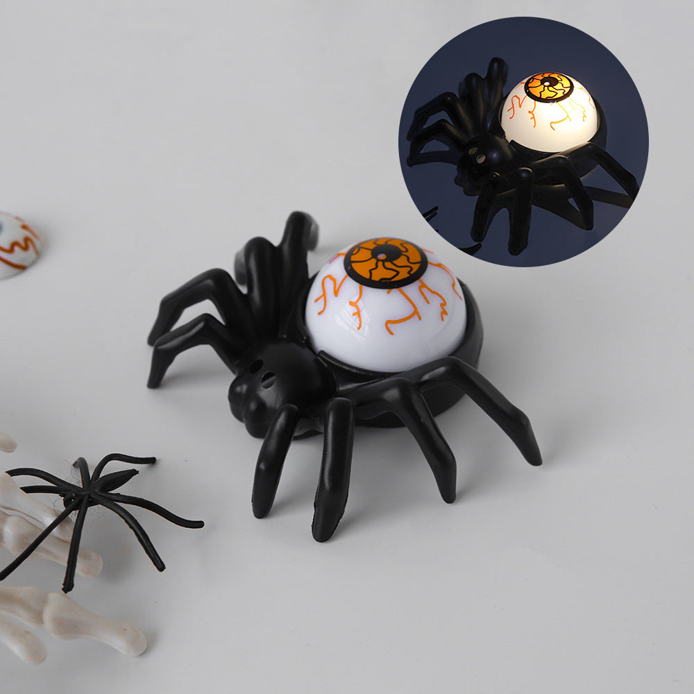Halloween Spider Back Eye Beads displaying an elegant black spider with an orange eye, contributing to luxurious Halloween celebrations.