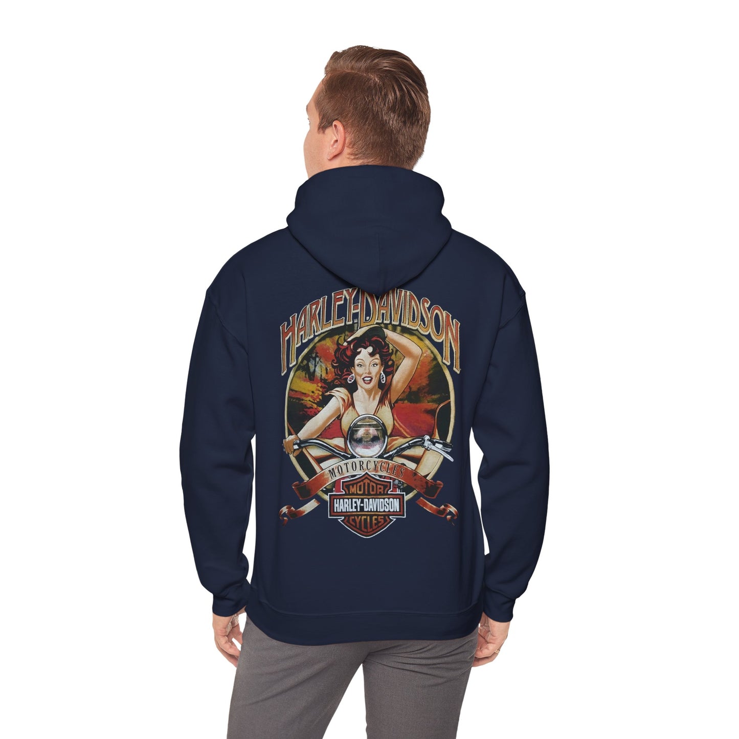 Model wearing a Harley-Davidson hoodie with vintage pin-up design on the back, capturing the essence of freedom and adventure in a refined setting.