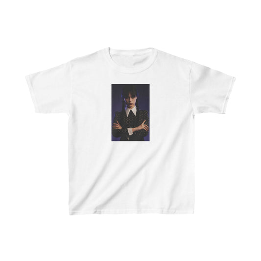 Child's 'Wednesday': Embrace the Dark Elegance! Graphic Unisex Tee Shirt displaying a refined design of a young girl in a sophisticated gothic attire, exuding mystery and allure.
