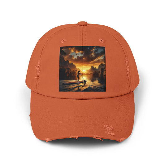 Unisex Distressed Paddleboarders Cap in vibrant orange, complete with an eye-catching sunset graphic, perfect for sun protection and paddleboarding fashion.