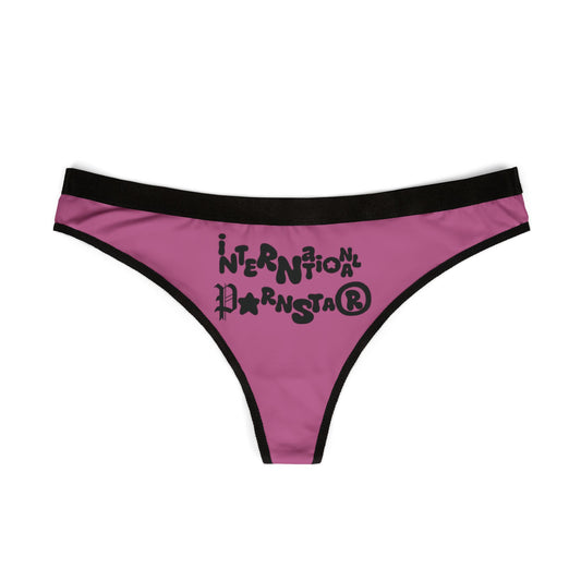 Front view of the exquisite International Star Womens Thong in vibrant pink featuring bold graphic text, perfect for adding a cheeky touch to your lingerie collection.