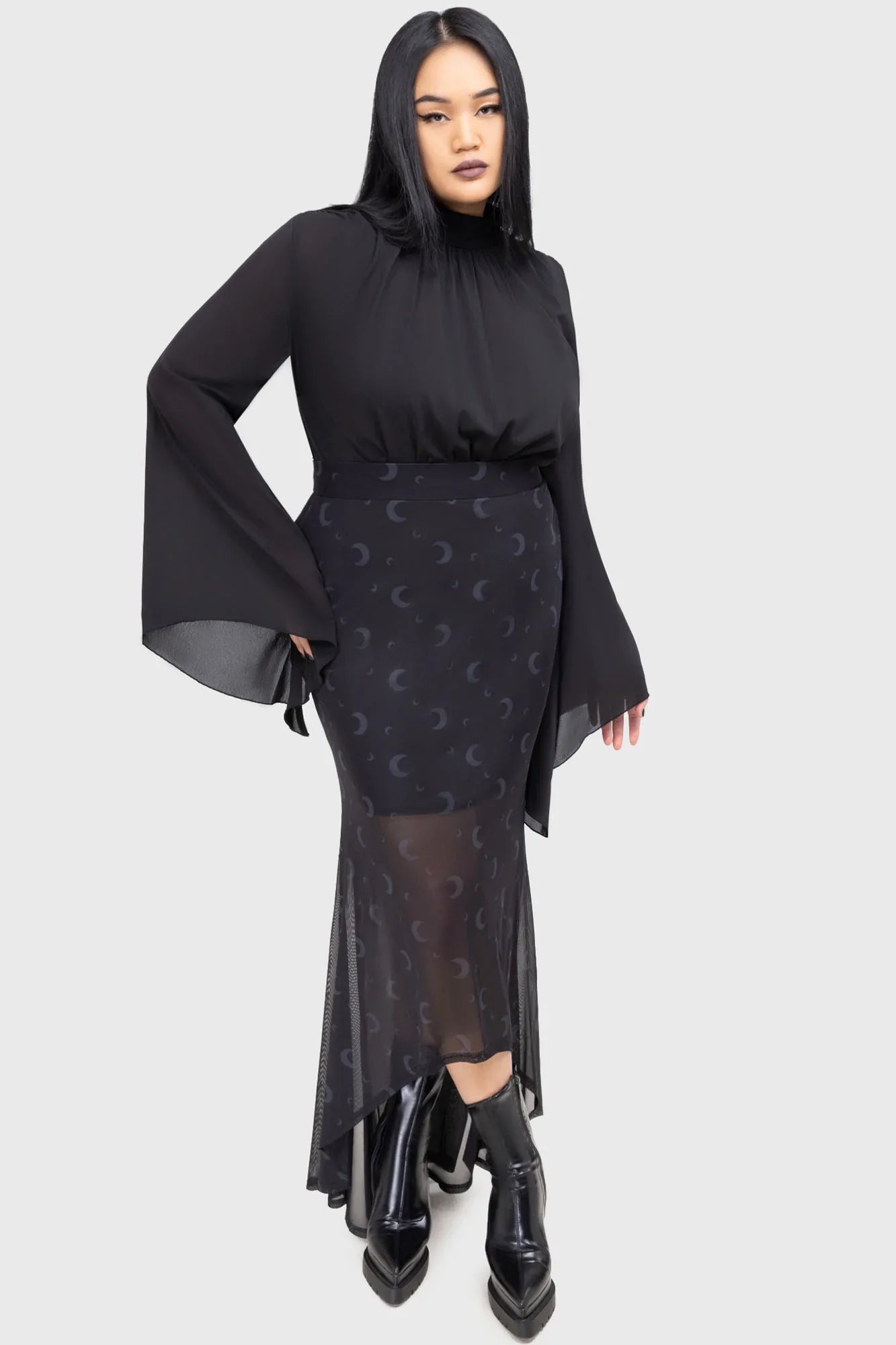 Killstar Astralune High Neck Flared Sleeve Top showcasing its intricate flared sleeves and elegant keyhole back detail, crafted from soft-touch woven fabric for an enchanting addition to alternative fashion.